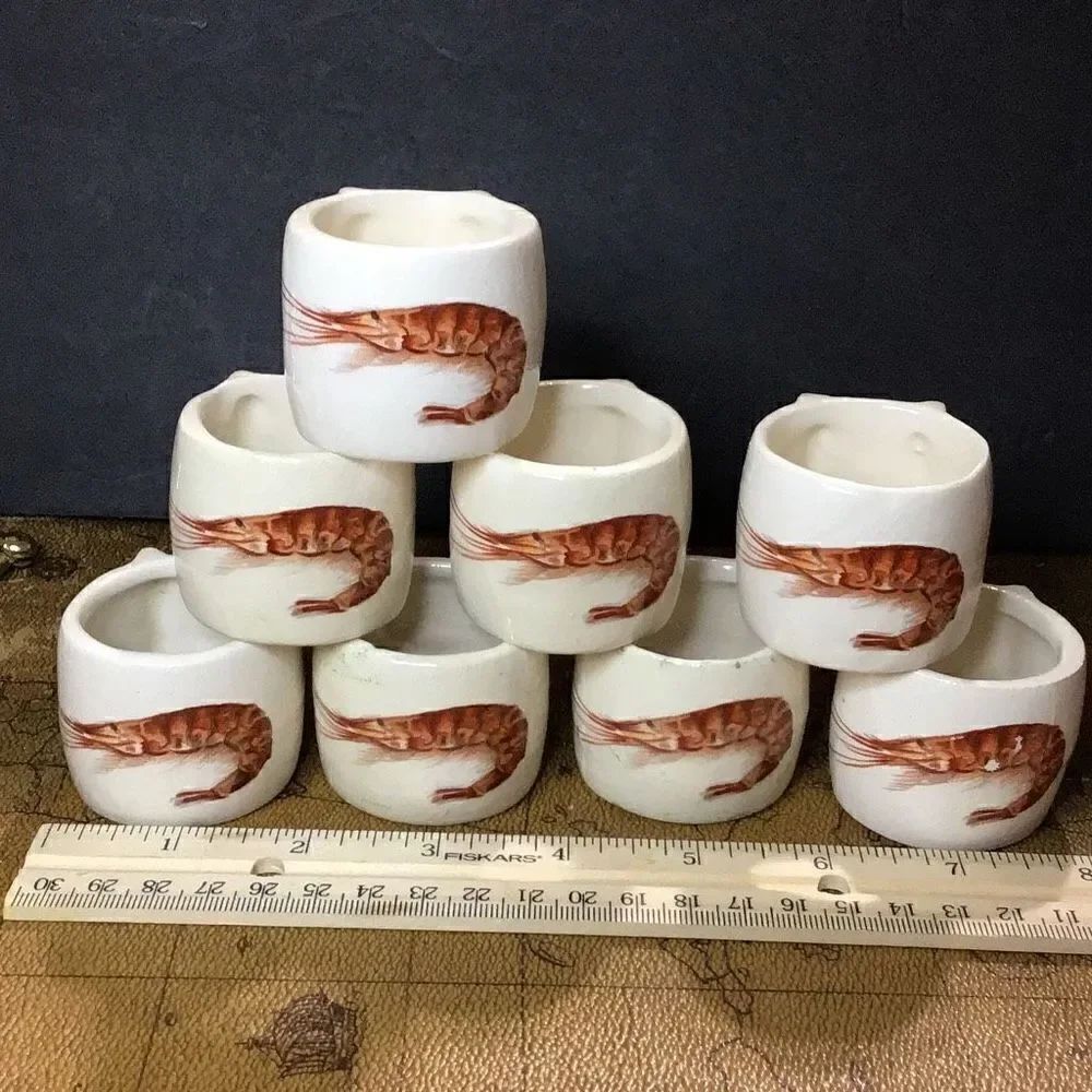 Napkin rings, vintage, ceramic shrimp embossed What moon look like chips are not